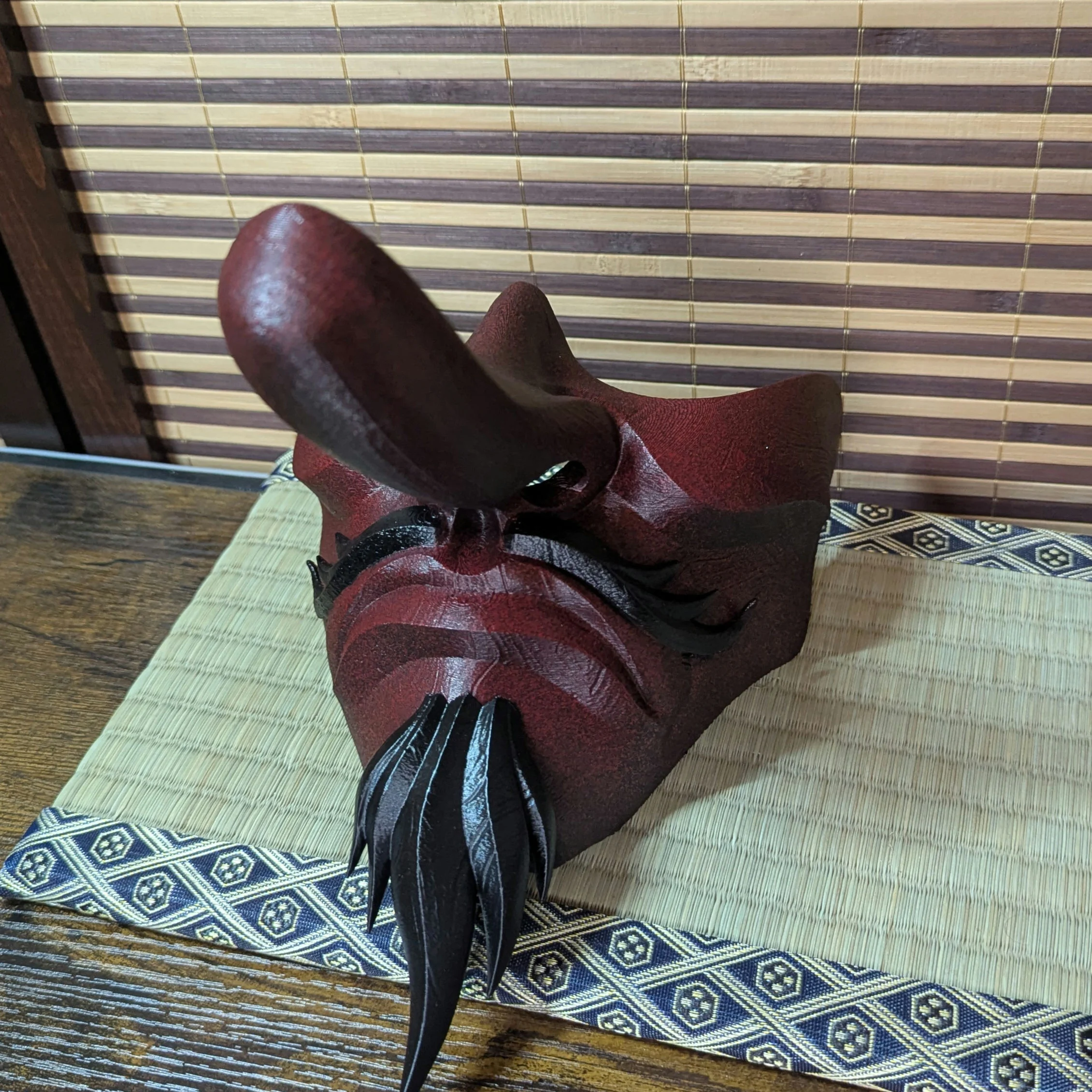 Hand-painted Tengu half-mask, handmade Japanese half-mask by Dai Yokai